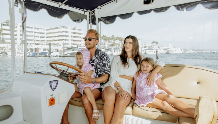 family on a duffy boat